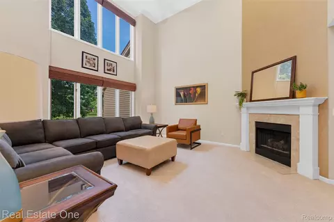 Living - 4884 Pine Eagles Ct, Genoa, MI 48116 photo 2 of 2