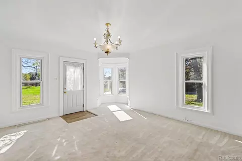 Living - 6136 Ormond Rd, Springfield, MI 48350 photo 2 of 4
