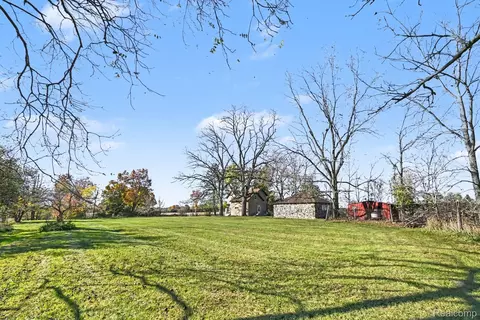 Exterior - 6136 Ormond Rd, Springfield, MI 48350 photo 9 of 12