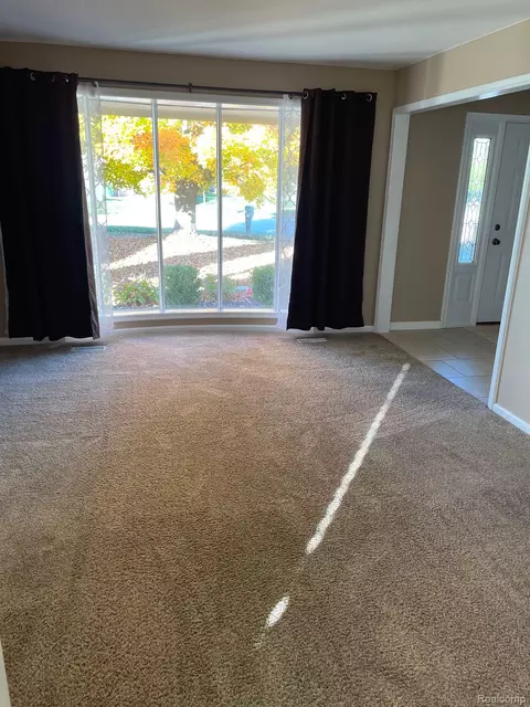 Living - 47152 Rosemary Rd, Macomb, MI 48044 photo 1 of 2