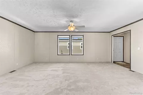 Living - 165 Apollo Cir, Flushing, MI 48433 photo 3 of 6
