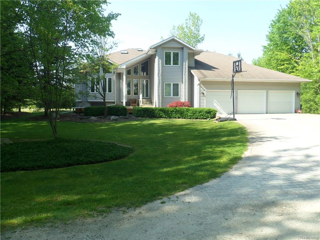 9390 Puttygut Rd, Casco, MI 48064 photo 1