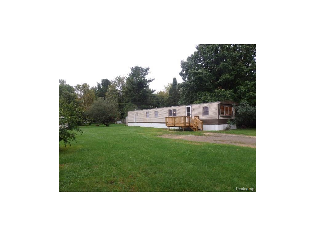 5789 Comanche Ln, Howell, MI 48843 photo 1