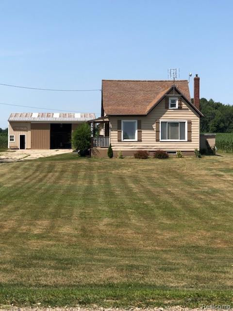7729 E Deckerville Rd, Novesta Twp, MI 48729 photo 1