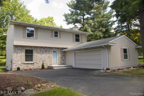 5658 Forest Green Dr, Perry, MI 48872 photo 1