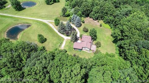 2489 Dutcher Rd, Howell, MI 48843 photo 1