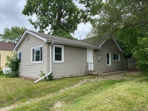 1202 E Hemphill Rd, Burton, MI 48529 photo 1