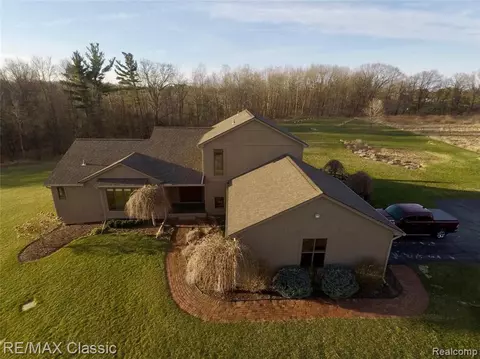 1255 Mountain Estates Ct, Leonard, MI 48367 photo 1