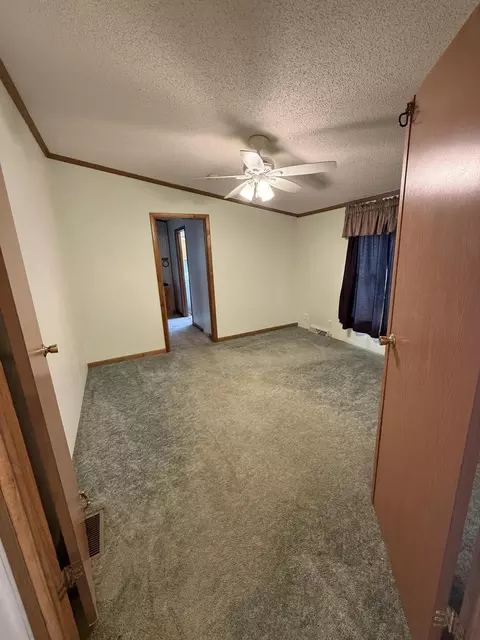 Bedroom - 8670 N Baldwin Rd, Rush, MI 48841 photo 4 of 6