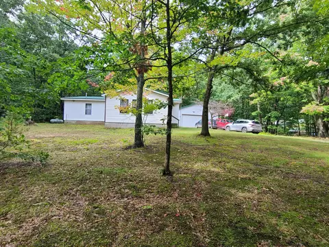 124 Osceola Ledge Dr, Rose Lake, MI 49655