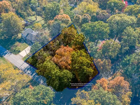 4869 N Whitman Cir, Webster, MI 48103