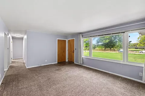 Living - 7553 Napoleon Rd, Leoni, MI 49201 photo 1 of 3