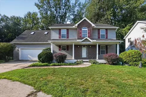 5677 Cartago Dr, Delhi, MI 48911