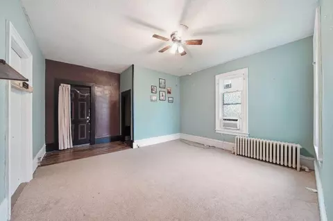 Living - 627 W Maumee St, Adrian, MI 49221 photo 2 of 2