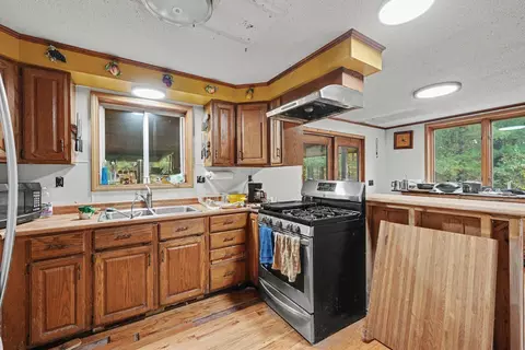 Kitchen - 2165 E Cherry Creek Rd, Fairview, MI 48621 photo 1 of 2