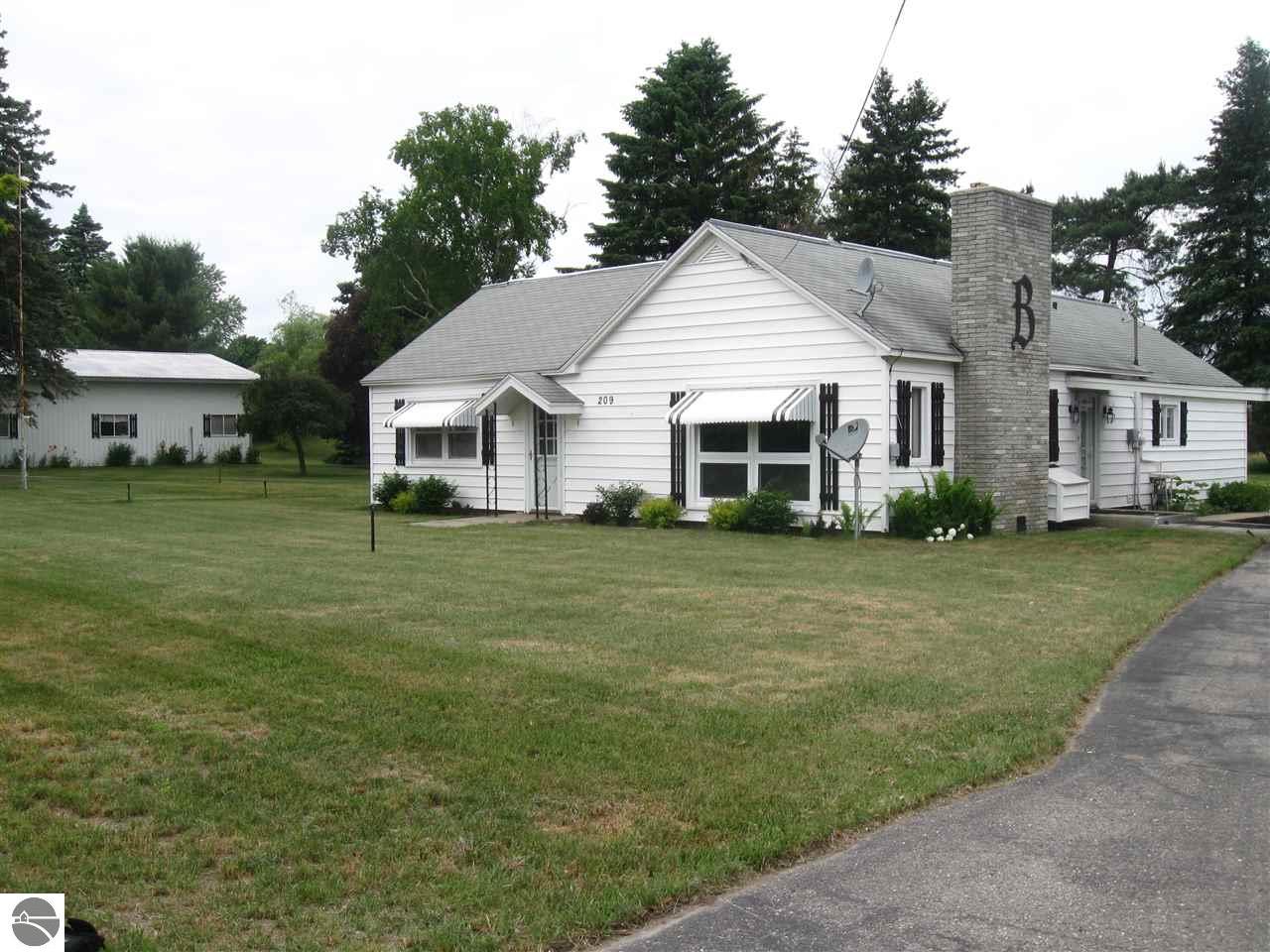 209 E 7th St, Manton, MI 49663 photo 1