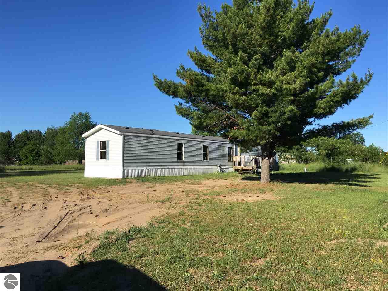 10657 Riley Rd, Interlochen, MI 49643 photo 1