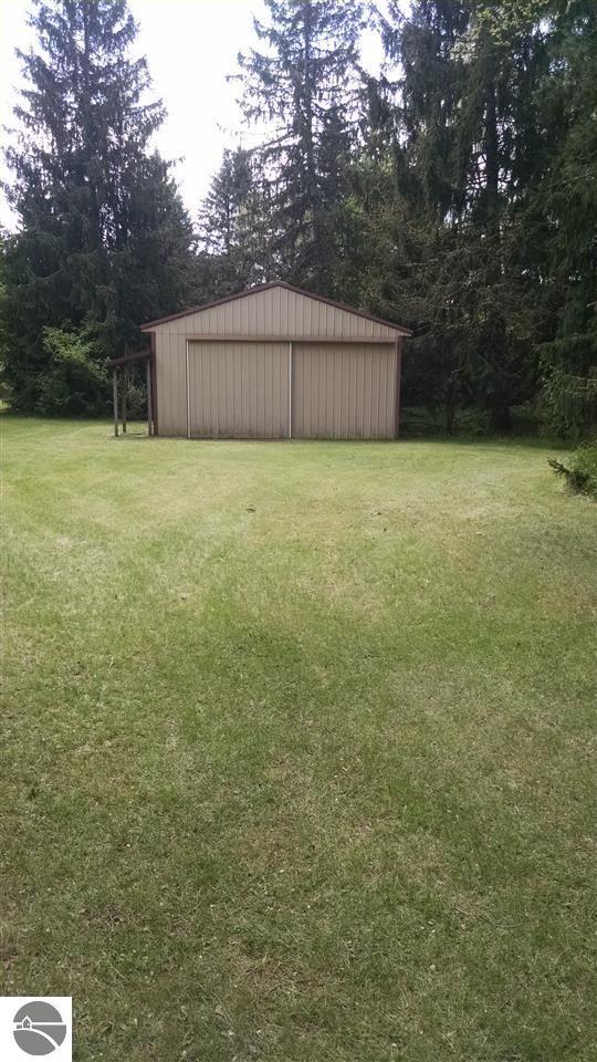 6207 Main St, Weidman, MI 48893 photo 1