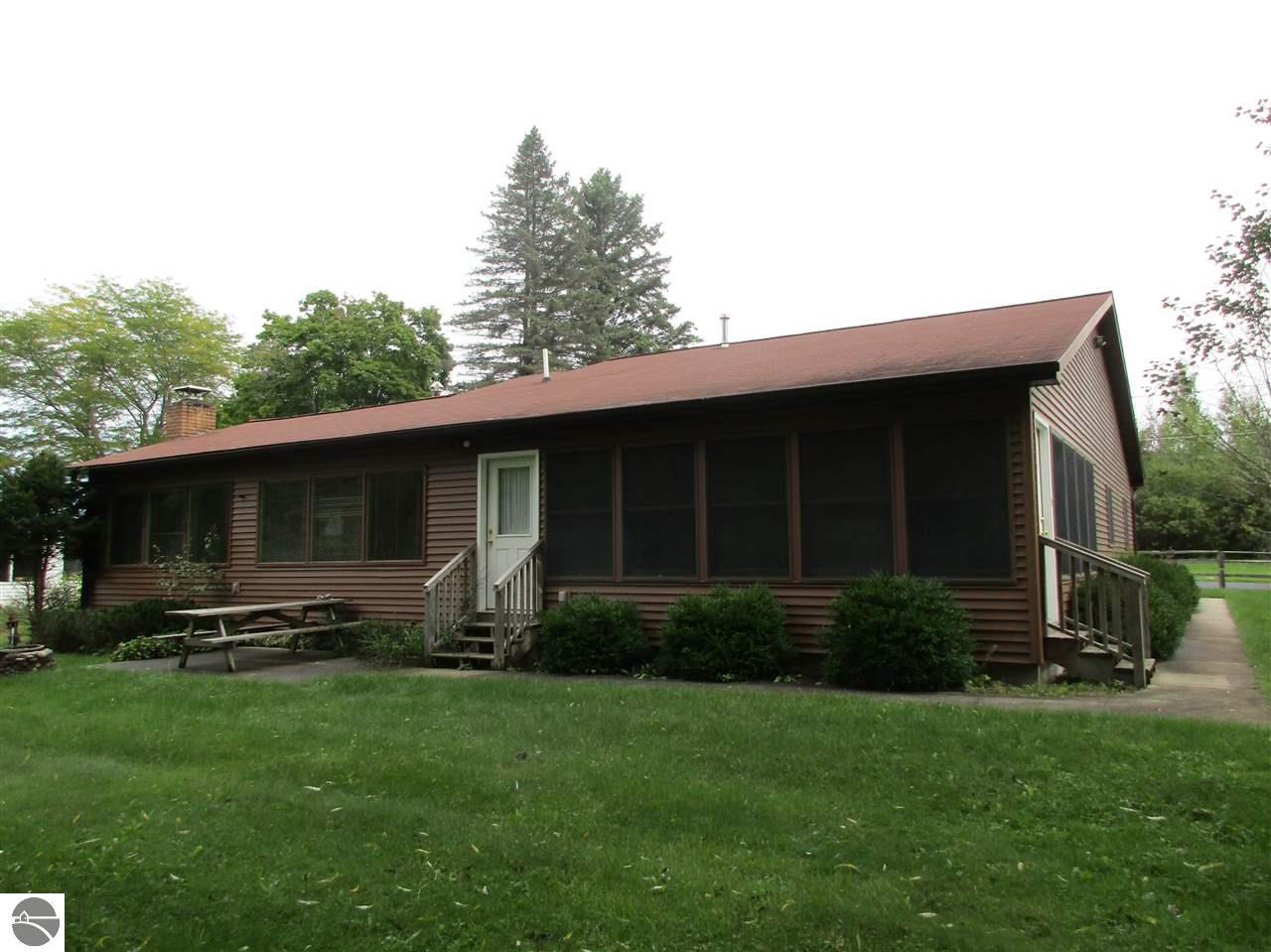 10691 Riverside Dr, Honor, MI 49640 photo 1