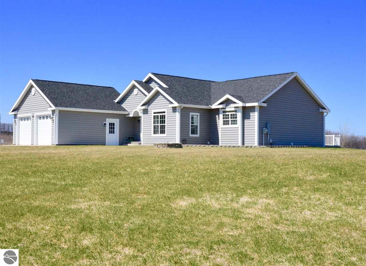 7509 E Meadows Dr, Cedar, MI 49621 photo 1