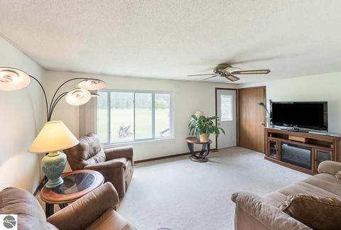 3731 E Mill Rd, Grawn, MI 49637 photo 1