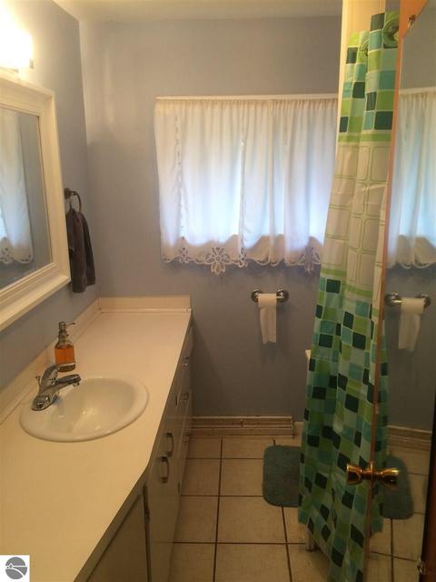7581 Maple St, Grawn, MI 49637 photo 11