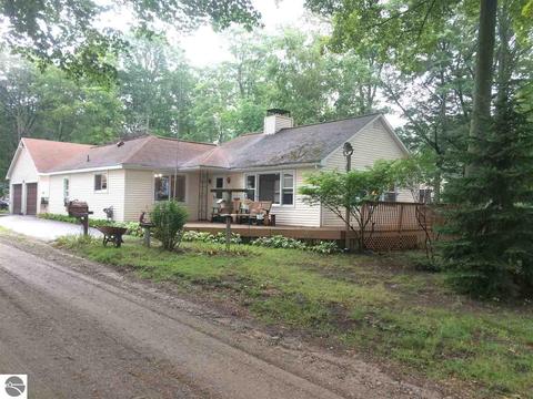7581 Maple St, Grawn, MI 49637 photo 1
