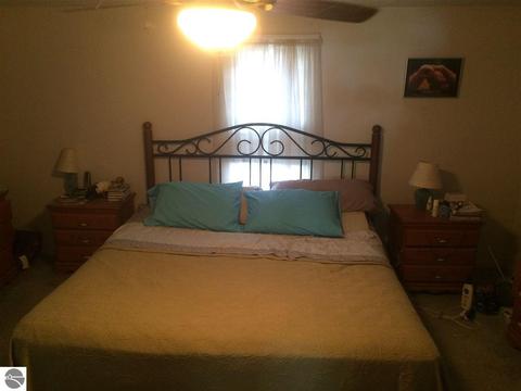 7581 Maple St, Grawn, MI 49637 photo 14