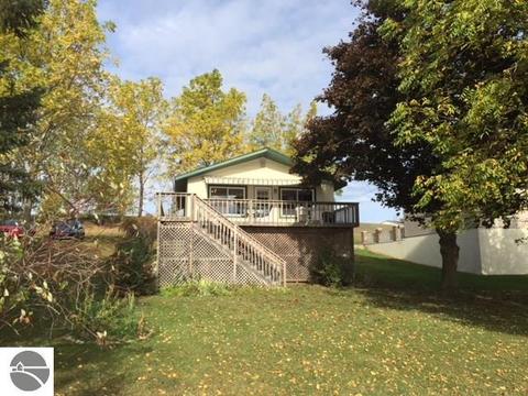 7038 E Kelenski Dr, Cedar, MI 49621 photo 1