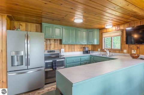 1104 E Traverse Lake Rd, Cedar, MI 49621 photo 7