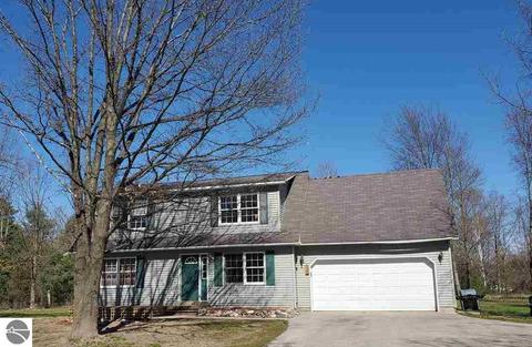 7655 Hampton Cir, Grawn, MI 49637 photo 1
