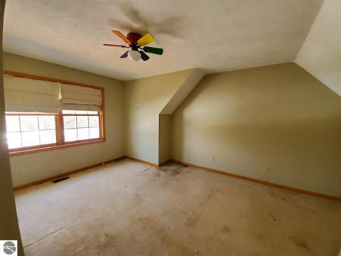 7655 Hampton Cir, Grawn, MI 49637 photo 9