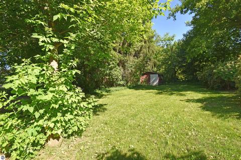 75 Mill St, Maple City, MI 49664 photo 34