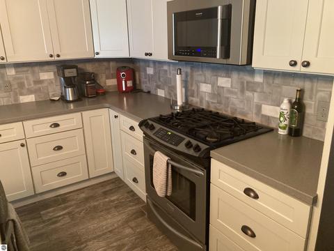 3816 E Shore Dr, Grawn, MI 49637 photo 3