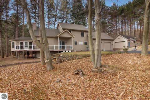 11507 Fisher Dr, Kewadin, MI 49648