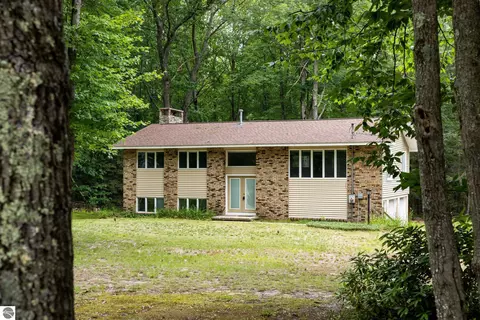 Exterior - 1513 Melody Ln, Interlochen, MI 49643 photo 11 of 15