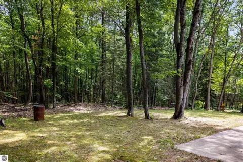 Exterior - 1513 Melody Ln, Interlochen, MI 49643 photo 9 of 15