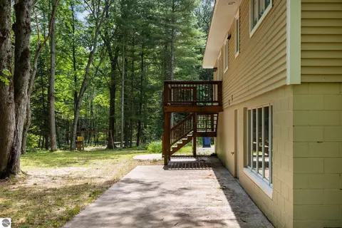Exterior - 1513 Melody Ln, Interlochen, MI 49643 photo 6 of 15
