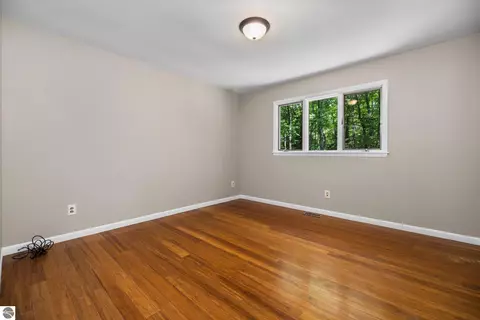 Bedroom - 1513 Melody Ln, Interlochen, MI 49643 photo 4 of 7