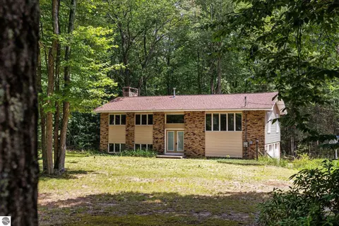 Exterior - 1513 Melody Ln, Interlochen, MI 49643 photo 2 of 15