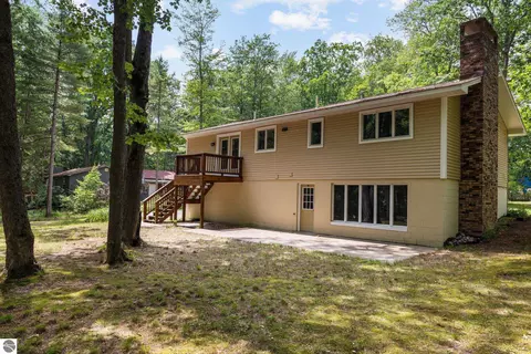 Exterior - 1513 Melody Ln, Interlochen, MI 49643 photo 5 of 15
