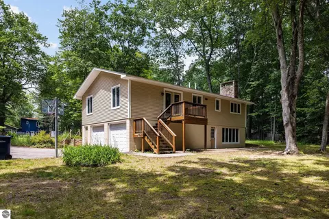 Exterior - 1513 Melody Ln, Interlochen, MI 49643 photo 3 of 15