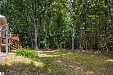 Exterior - 1513 Melody Ln, Interlochen, MI 49643 photo 10 of 15