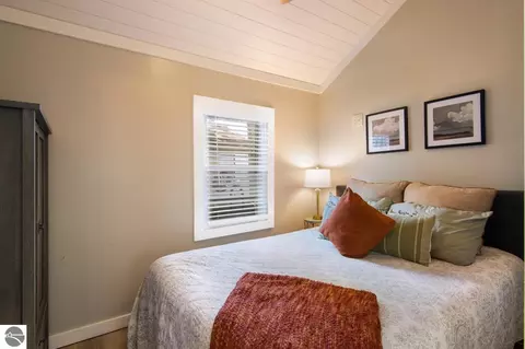 Bedroom - 8246 Deadstream Rd #6, Honor, MI 49640 photo 1 of 2