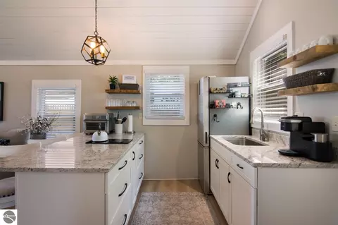 Kitchen - 8246 Deadstream Rd #6, Honor, MI 49640 photo 2 of 4