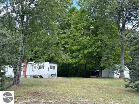 7235 Willowbrook Cir, Mancelona, MI 49659