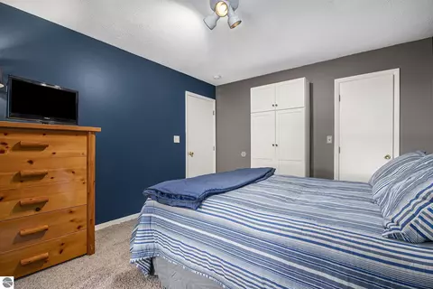 Bedroom - 2541 E Cherry Ln, Cedar, MI 49621 photo 2 of 4