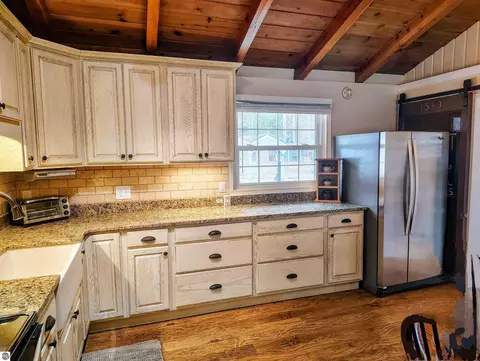 Kitchen - 100 Hemlock Rd, Roscommon, MI 48653 photo 6 of 6