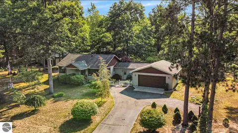 9687 Pine Circle Dr NW, Rapid City, MI 49676