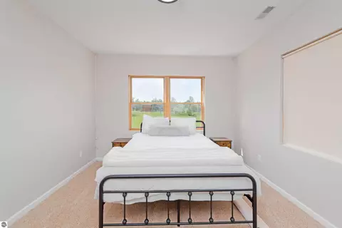 Bedroom - 7495 Bennett Rd, Williamsburg, MI 49690 photo 3 of 10